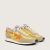 Zapatillas Marathon para mujer con parte superior de nailon amarillo y estrella naranja