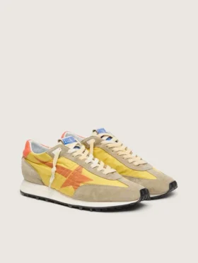Zapatillas Marathon para mujer con parte superior de nailon amarillo y estrella naranja