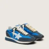 Zapatillas Marathon para mujer con parte superior de nailon azul y estrella blanca