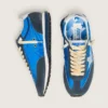 Zapatillas Marathon para mujer con parte superior de nailon azul y estrella blanca