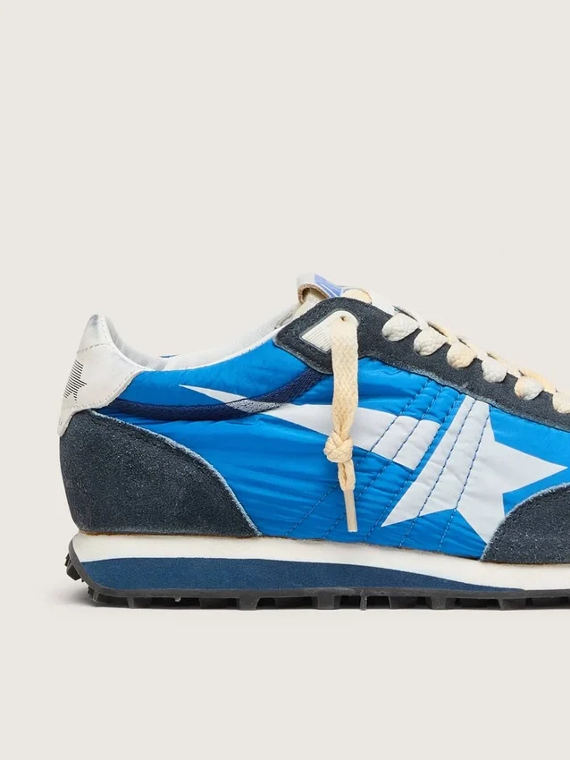 Zapatillas Marathon para mujer con parte superior de nailon azul y estrella blanca