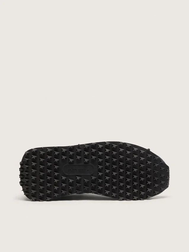 Zapatillas Marathon para mujer con parte superior de nailon azul y estrella blanca