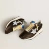Zapatillas Marathon para mujer con parte superior de nailon negro y estrella blanca