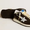 Zapatillas Marathon para mujer con parte superior de nailon negro y estrella blanca