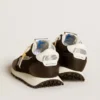 Zapatillas Marathon para mujer con parte superior de nailon negro y estrella blanca