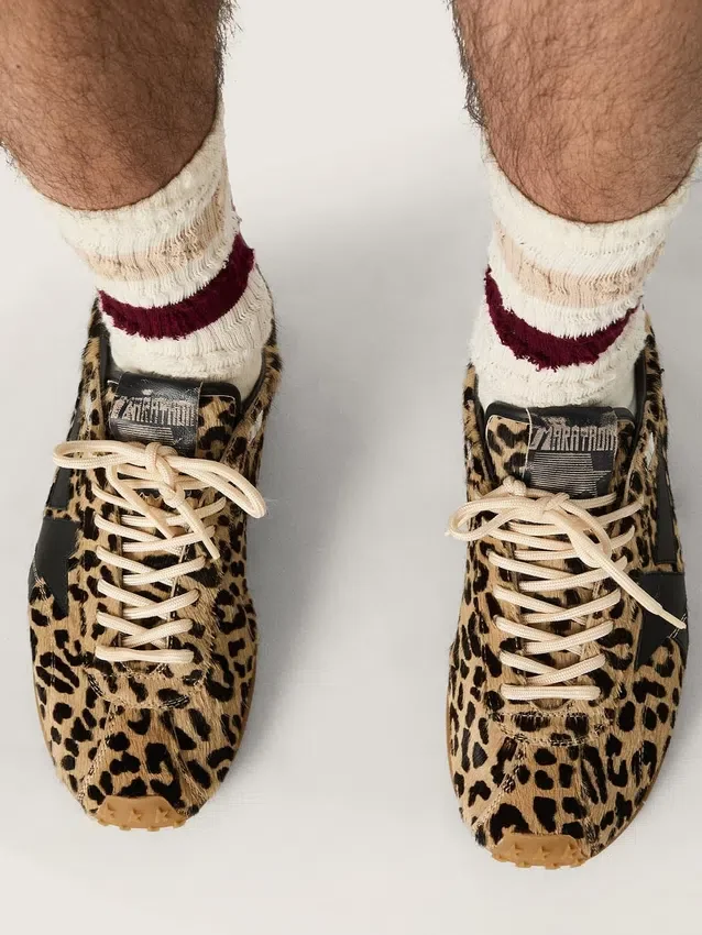 Zapatillas Marathon Speed para hombre en piel de potro con estampado de leopardo en tonos beige y negro, con estrella de piel negra