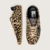 Zapatillas Marathon Speed para hombre en piel de potro con estampado de leopardo en tonos beige y negro, con estrella de piel negra