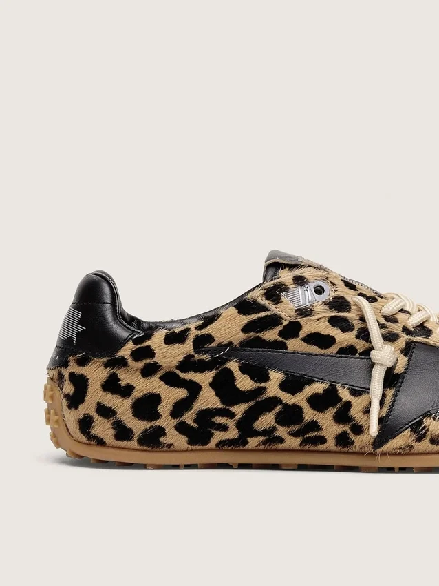 Zapatillas Marathon Speed para hombre en piel de potro con estampado de leopardo en tonos beige y negro, con estrella de piel negra