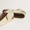 Zapatillas Mid Star para hombre en beige brillante con estrella de ante amarillo y detalle de algodón
