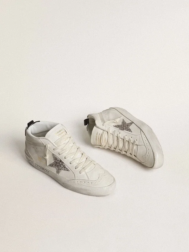 Zapatillas Mid Star para mujer con estrella plateada brillante y lengüeta del talón laminada en negro