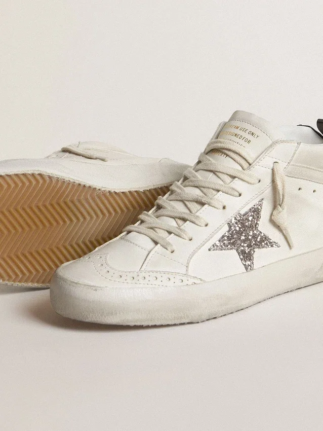 Zapatillas Mid Star para mujer con estrella plateada brillante y lengüeta del talón laminada en negro