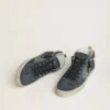 Zapatillas Mid Star para mujer en ante azul petróleo con estrella plateada brillante y detalle de algodón