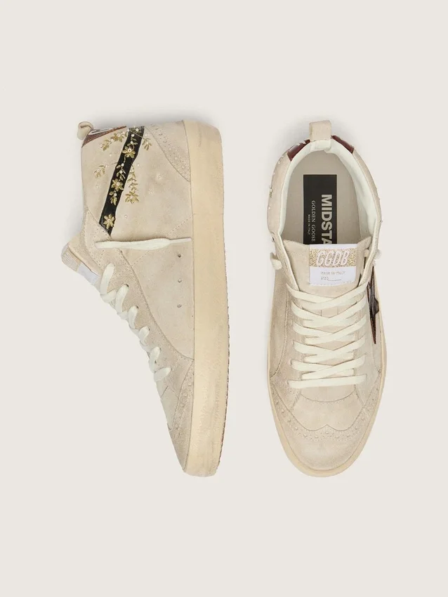 Zapatillas Mid Star para mujer en ante color perla con estrella de piel burdeos e inserciones de perlas y bordados