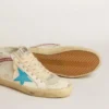 Zapatillas Mid Star para mujer en piel con estrella azul claro y detalle de ante fucsia con tachuelas platino