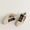 Zapatillas Mid Star para mujer en piel Naplak beige con estrella de piel de potro con estampado de leopardo