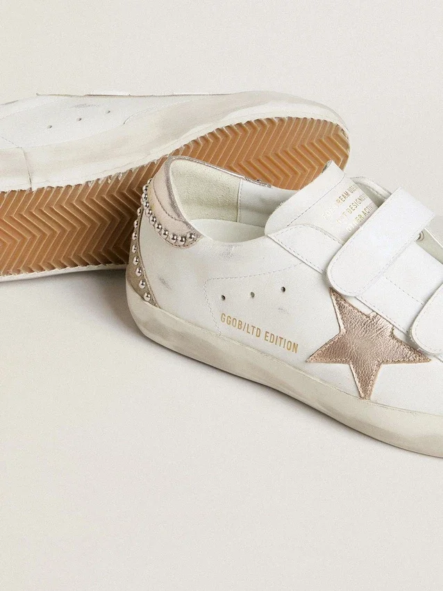 Zapatillas Old School LTD para mujer con estrella y lengüeta en el talón de piel metalizada en oro rosa