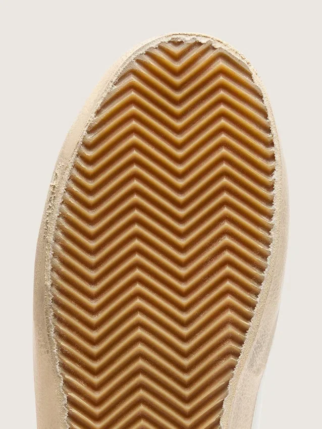 Zapatillas Old School para mujer con estrella dorada en piel laminada