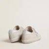 Zapatillas Old School para mujer en ante gris claro con una estrella de piel con microbrillo