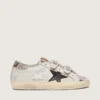 Zapatillas Old School para mujer en piel blanca con estrella de piel negra e inserciones con estampado de serpiente