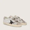 Zapatillas Old School para mujer en piel blanca con estrella de piel negra e inserciones con estampado de serpiente