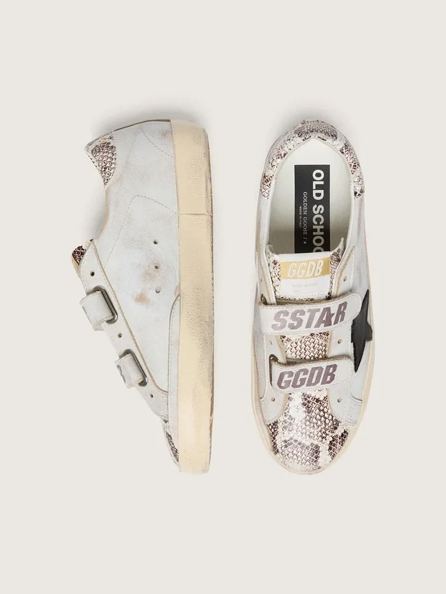 Zapatillas Old School para mujer en piel blanca con estrella de piel negra e inserciones con estampado de serpiente