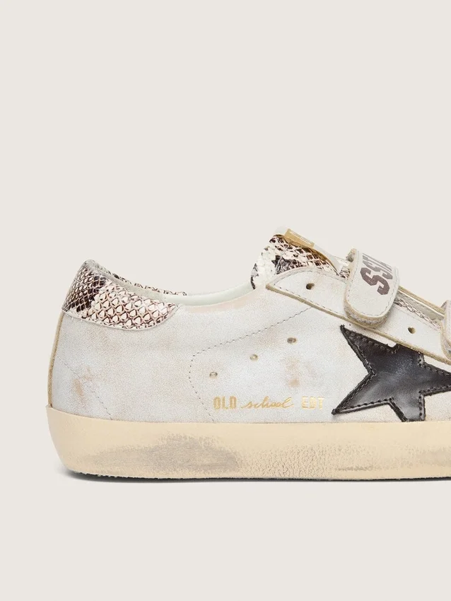 Zapatillas Old School para mujer en piel blanca con estrella de piel negra e inserciones con estampado de serpiente
