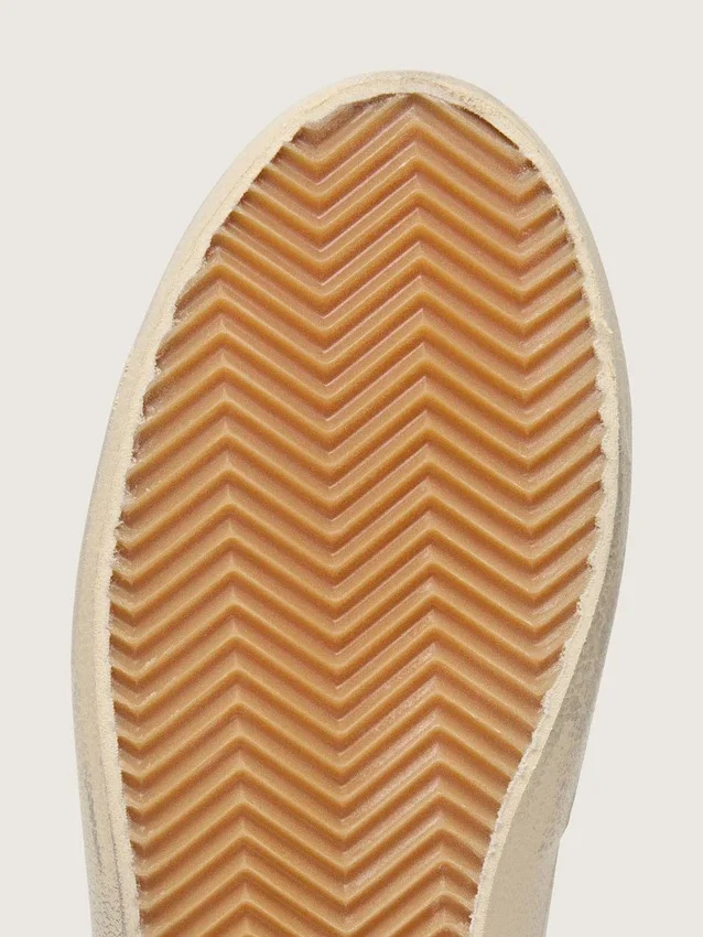 Zapatillas Old School para mujer en piel blanca con estrella de piel negra e inserciones con estampado de serpiente