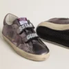 Zapatillas Old School para mujer en piel laminada morada con estrella de nubuck lila y lengüeta en el talón