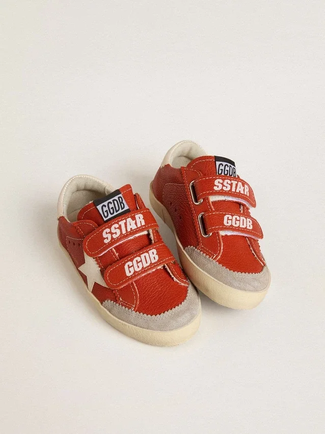 Zapatillas «Old School» para niños en napa naranja con estrella blanca y lengüeta del talón de cuero color crema