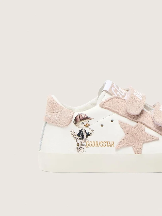 Zapatillas para bebé en napa con estrella de ante rosa y estampado de mascota