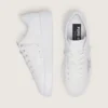 Zapatillas Purestar para mujer en piel blanca con estrella de cristal Swarovski plateada