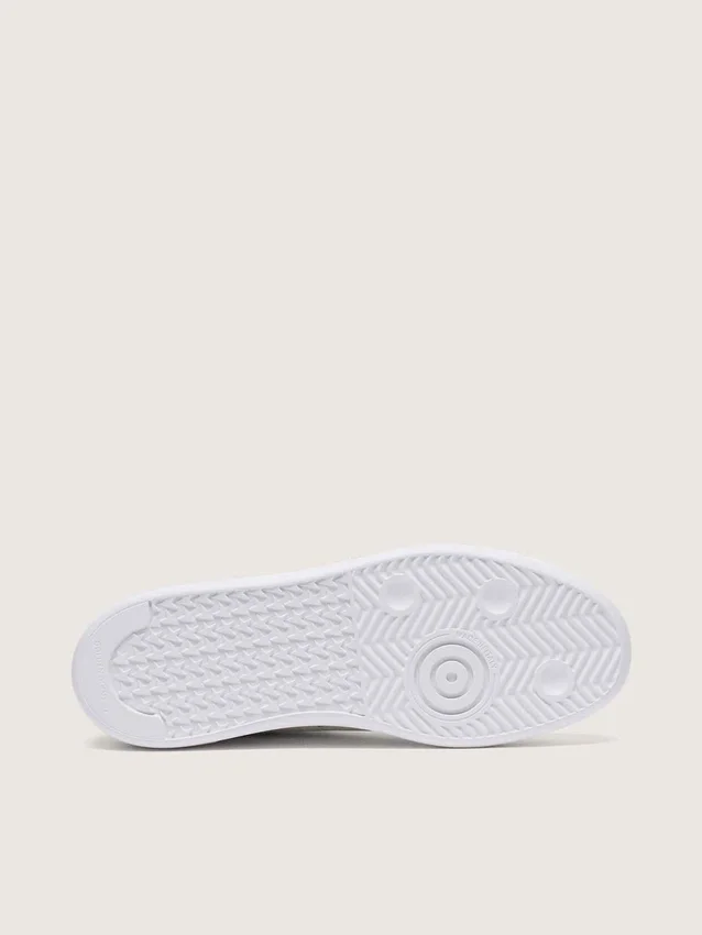 Zapatillas Purestar para mujer en piel blanca con estrella de cristal Swarovski plateada