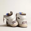 Zapatillas Sky-Star para mujer en piel napa blanca con estrella de ante color chocolate