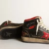 Zapatillas Sky-Star para mujer en piel negra brillante con estrella roja