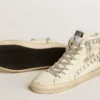 Zapatillas Slide con estrella de piel metalizada plateada y detalle de piel con estrellas