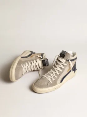 Zapatillas Slide de malla beige y nailon con estrella de cuero azul y detalle brillante