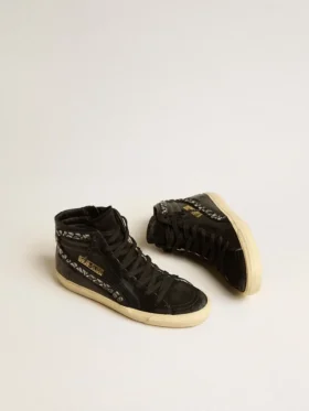 Zapatillas Slide de piel con estrella negra y detalles de cristales Swarovski