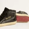 Zapatillas Slide de piel con estrella negra y detalles de cristales Swarovski