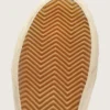 Zapatillas Slide en color beige con estrella y detalle brillante de piel metalizada rosa