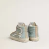 Zapatillas Slide para hombre en lona azul claro con detalle de piel metalizada plateada