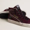 Zapatillas Slide para mujer en ante y purpurina de cereza negra con estrella de piel y detalle de piel metalizada