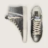 Zapatillas Slide para mujer en negro y purpurina plateada con estrella de cuero y detalles metalizados