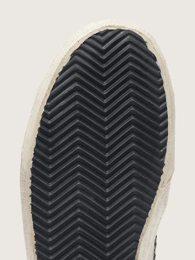 Zapatillas Slide para mujer en negro y purpurina plateada con estrella de cuero y detalles metalizados