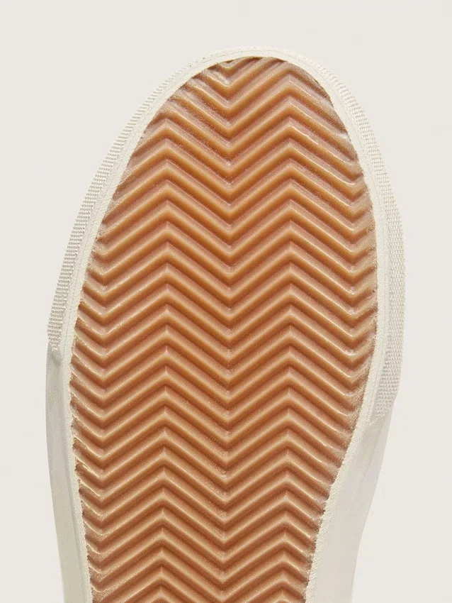 Zapatillas Slide para mujer en piel blanca con estrella plateada con purpurina y detalle en piel rosa