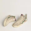 Zapatillas Slide para mujer en piel de potro con estampado de cebra y detalle en piel laminada verde