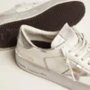 Zapatillas Stardan con estrella de piel metalizada plateada y lengüeta en el talón