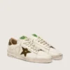 Zapatillas Stardan para hombre en piel blanca con estrella y lengüeta en el talón de piel con estampado de serpiente en verde militar