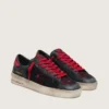 Zapatillas Stardan para hombre en piel negra con estrella roja e inserciones de malla negra y piel roja