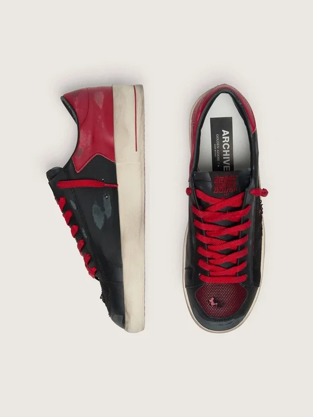 Zapatillas Stardan para hombre en piel negra con estrella roja e inserciones de malla negra y piel roja