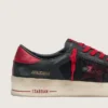 Zapatillas Stardan para hombre en piel negra con estrella roja e inserciones de malla negra y piel roja